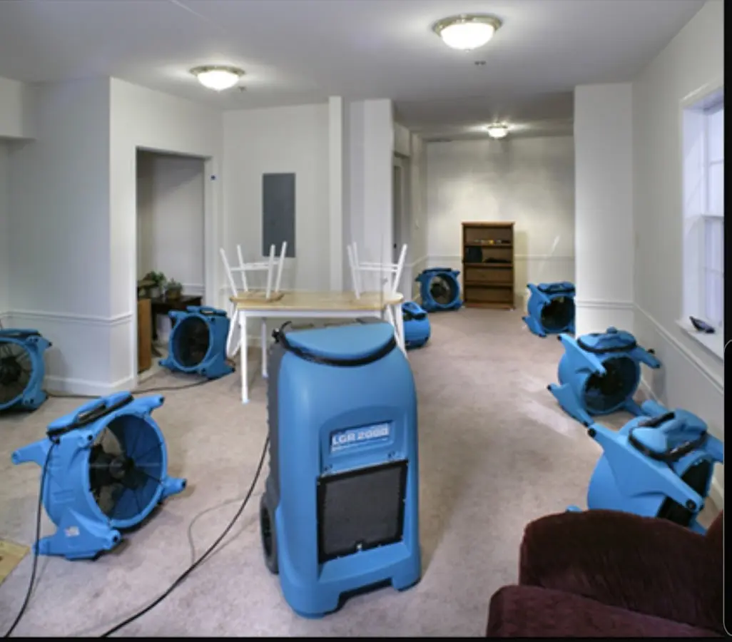 Air movers and dehumidifier setup for Water Damage Restoration in Whitehouse